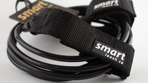 Image of large wave surf leash