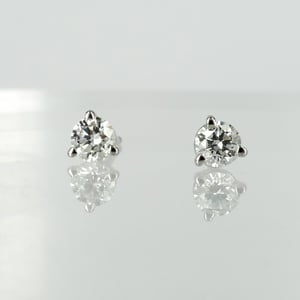 Image of 14k white gold diamond stud earrings, 2 = .30ct F/G SI total weight. PJ5821