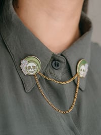 Emmrich collar pins