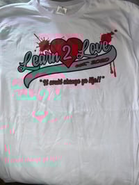 White “it could change ya life” t 