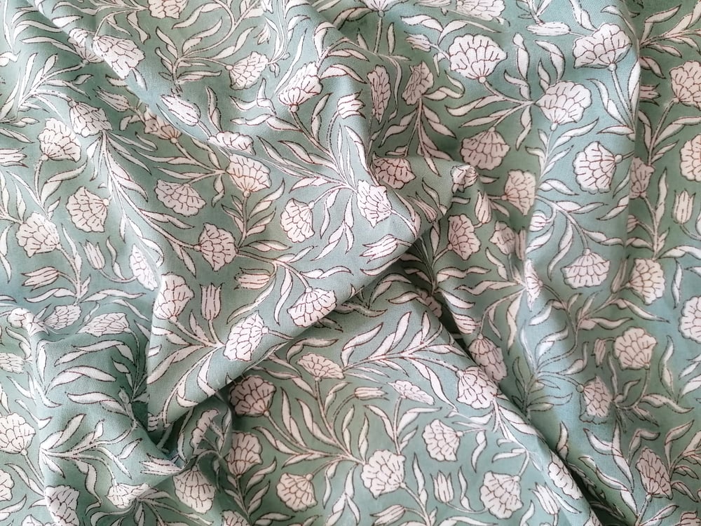 Image of Namaste fabric petits œillets fond vert 