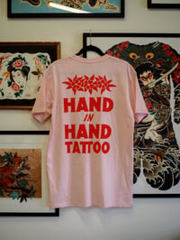 Image 1 of Back Floral Hand in Hand Logo 