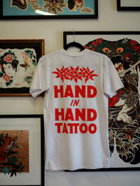 Image 4 of Back Floral Hand in Hand Logo 