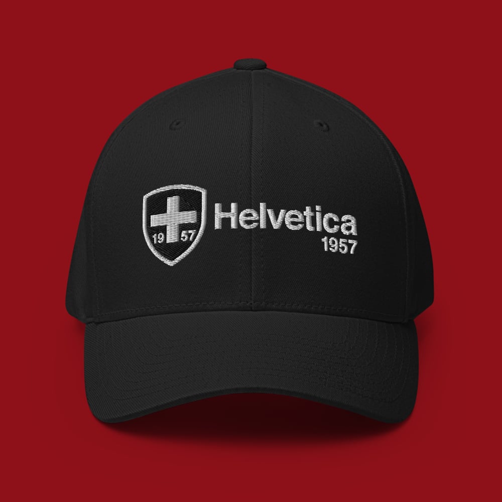 Image of TEAM HELVETICA - 1957 FLEXFIT STRUCTURED CAP - BLACK