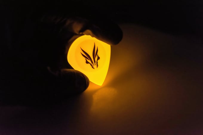 Image of 4mm 'Orange LAVA' plectrums 