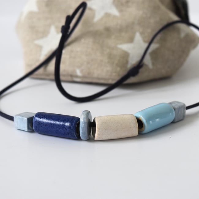 Blue & Cream Ceramic Beads -  Faux Suede Band