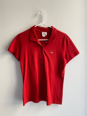 red Lacoste polo