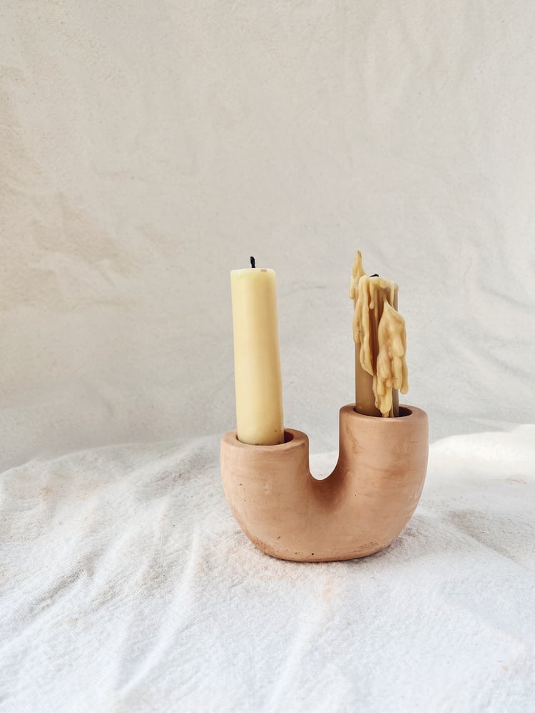 Image of rising candle holder