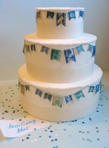 Image of Blue Vintage Stamp Wedding Cake Garland