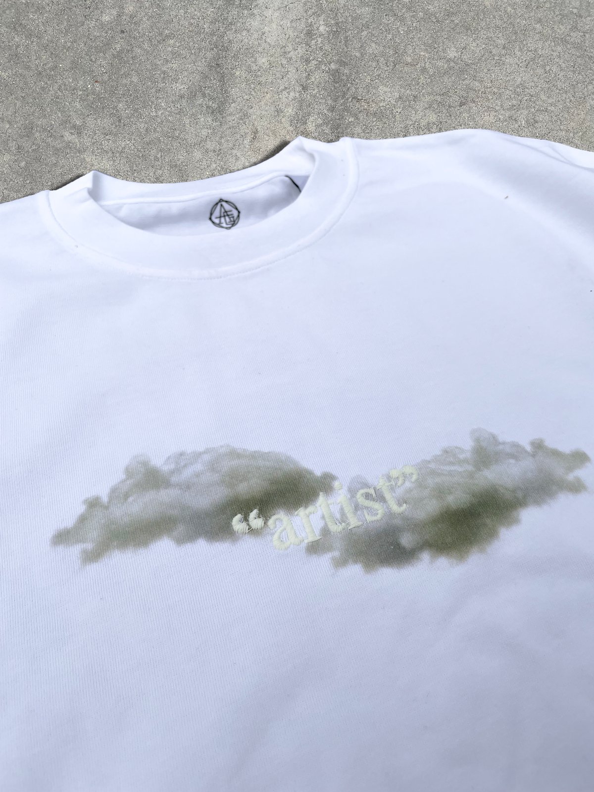 Image of RESTOCK Clouds logo tee - BOXYFIT