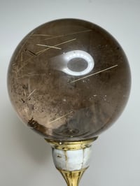 Image 25 of Golden Rutile In Smoky Quartz Sphere #1771