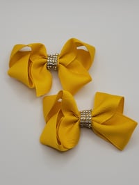 Image 4 of Yellow Bows