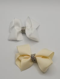 Image 1 of Cream & White Bows