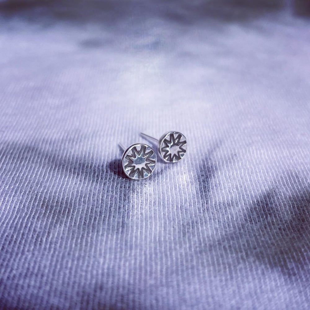 Image of Handmade sterling silver nine point star stud earrings