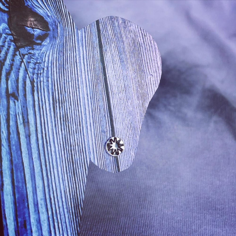 Handmade sterling silver nine point star stud earrings