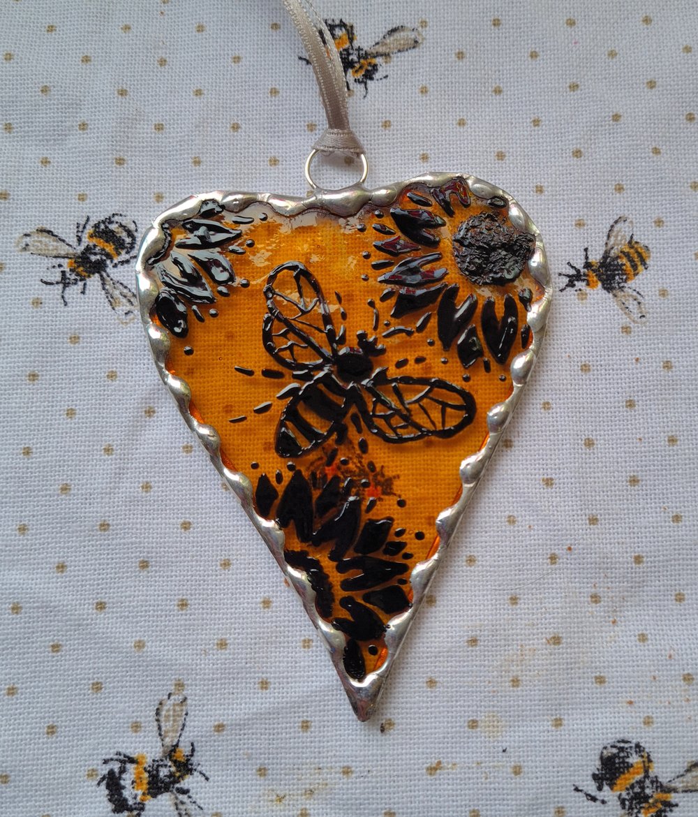 Image of Small Honey Bee and Sunflower Heart