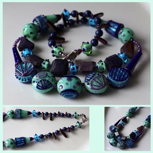 Lapis River - junk drawer necklace featuring loads of lampwork and sugilite