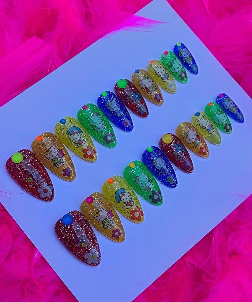 Image of Rainbow glitter jelly Hello Kitty kawaii 🌈