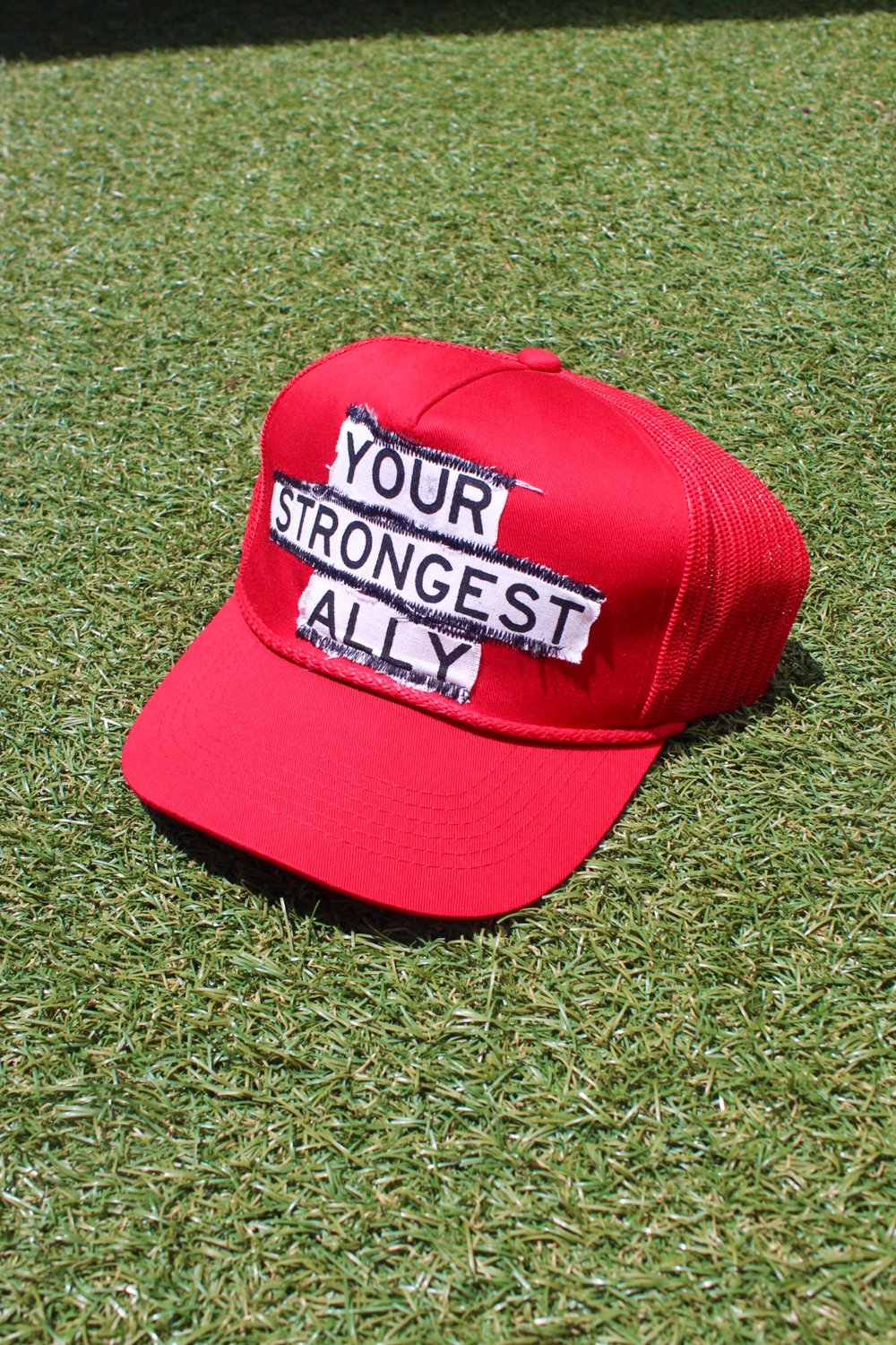 your strongest ally trucker hat in red 