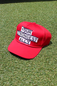 Image of your strongest ally trucker hat in red 