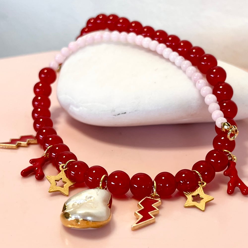 Image of Pink and Red glass bead necklace with pearl, lightning bolts and coral drops