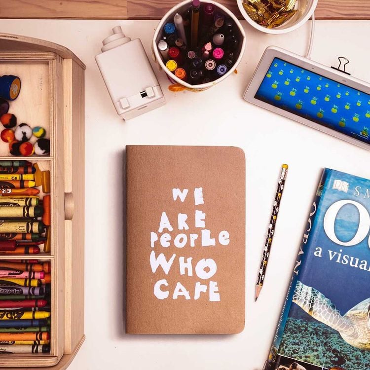 Image of We Are People Who Care Notebook