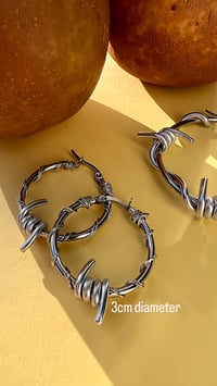 Image 2 of SILVER STAINLESS STEEL BARBED WIRE HOOPS 