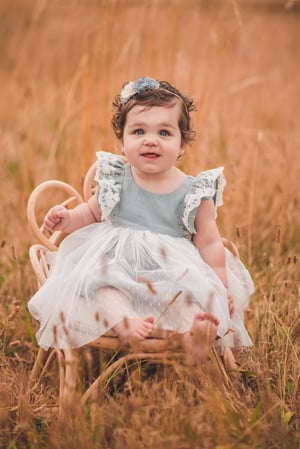 Image of Special occasion dress in dusty blue 