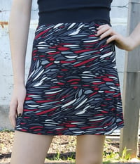 Image 1 of Short ladies skirt red wave