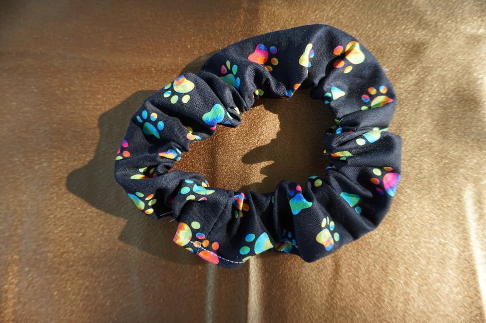 Image of Tie Dye Paw Prints Scrunchie/Mask/Headband