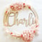 Image of Bamboo name wreath with preserved florals 