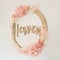 Image of Bamboo name wreath with preserved florals 