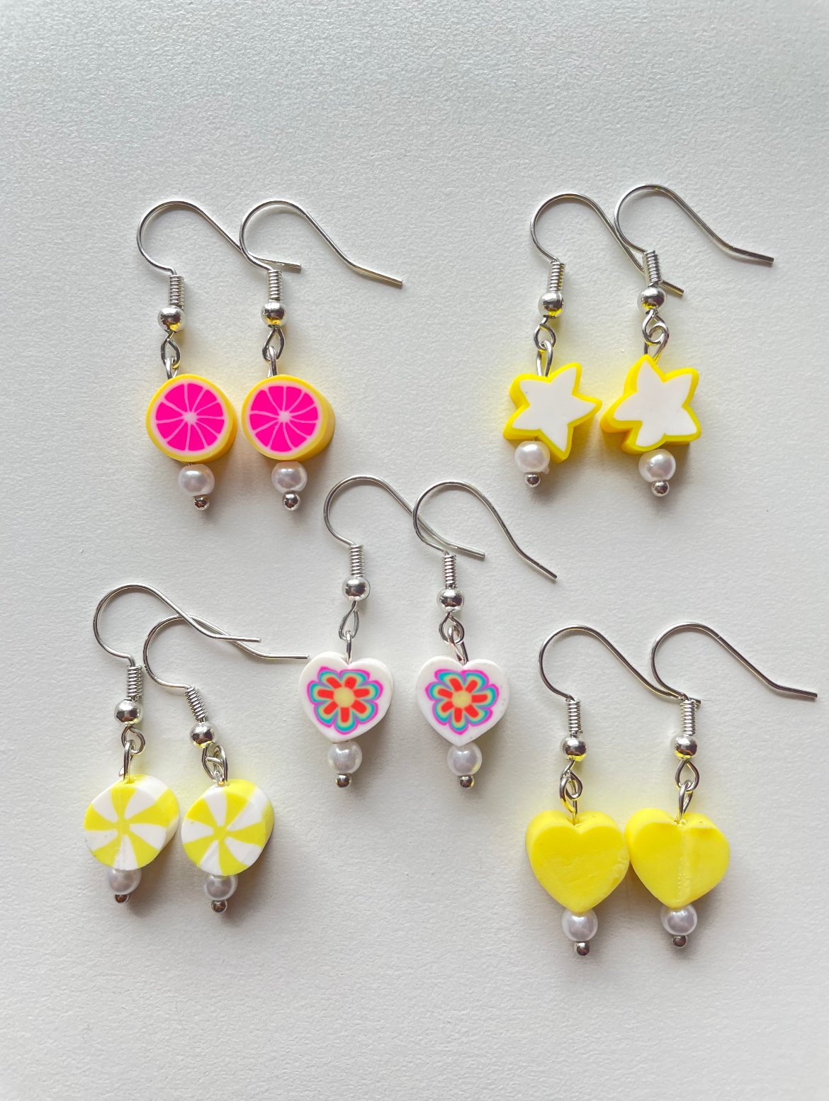 Image of charm earrings