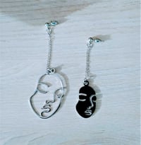 Silver Toned Double-Faced Earrings