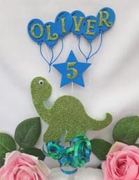 Image 1 of Personalised Dino Cake Topper, ANY AGE Dinosaur Cake Topper, Glitter Dino Topper