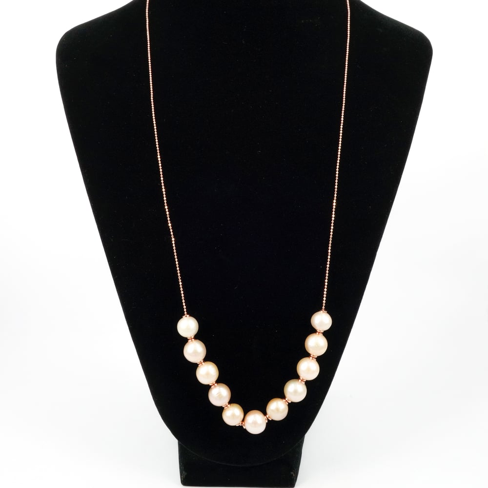 Image of Rose gold / sterling silver necklace with adjustable peach coloured fresh water pearls. M3226 