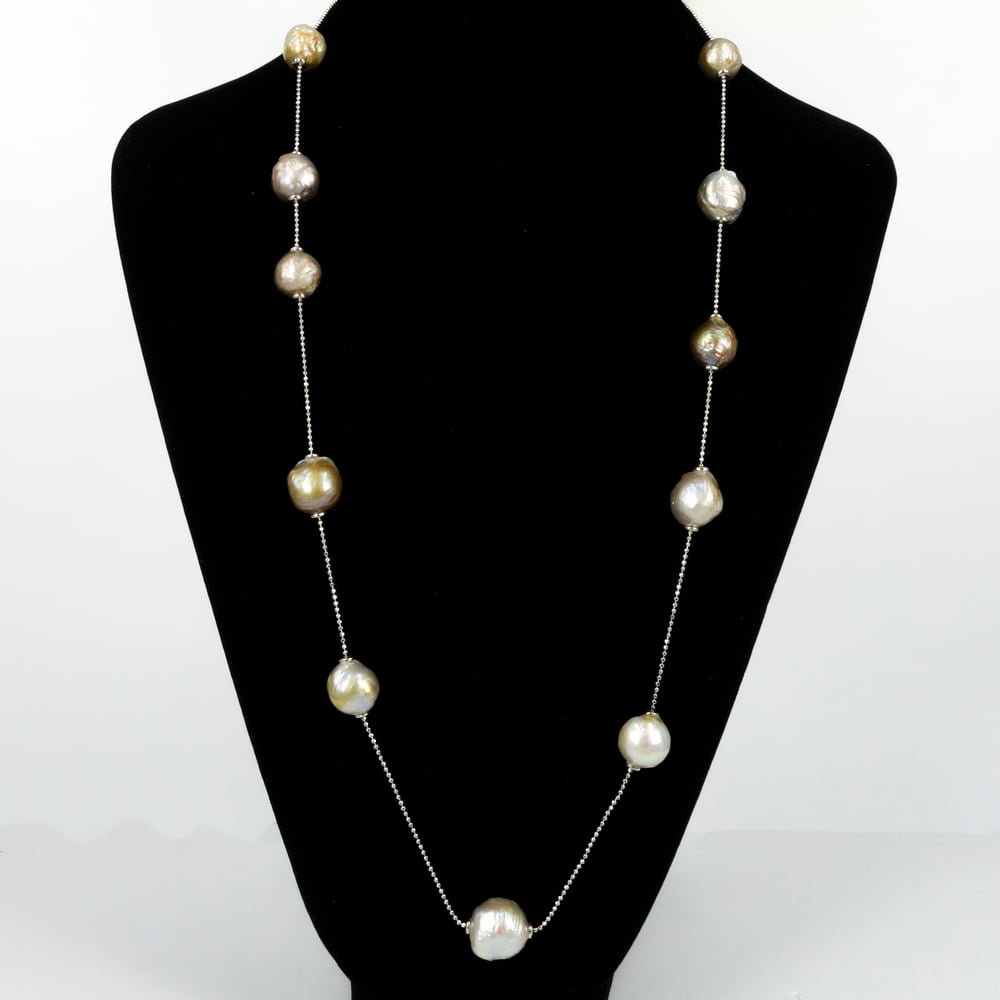 Image of Sterling silver necklace with adjustable cream fresh water pearls. M3228a