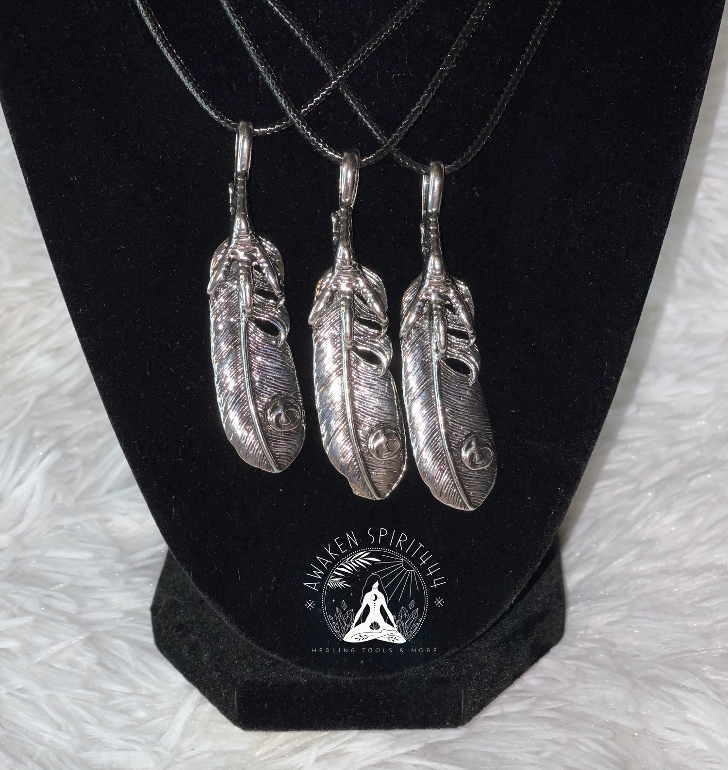 Image of Bird claw feather pendant