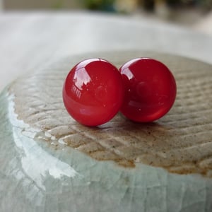 Image of red studs - round