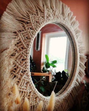 Macramé mandala mirror in rainbow dust