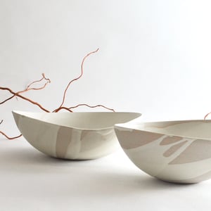 Image of altered stoneware serving bowls