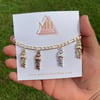 San Judas tri-color charm bracelet