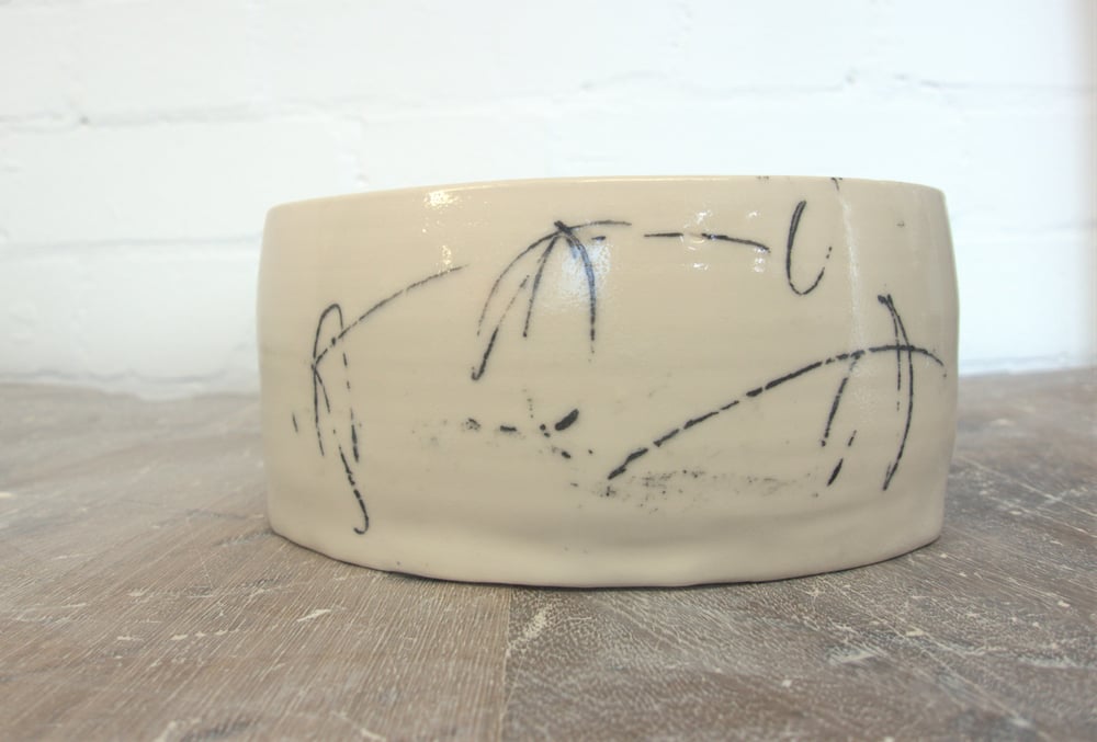 Image of Egg shaped dish with slip decoration and monoprints