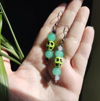 Image 4 of Green Skull Earrings 