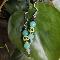 Image 1 of Green Skull Earrings 