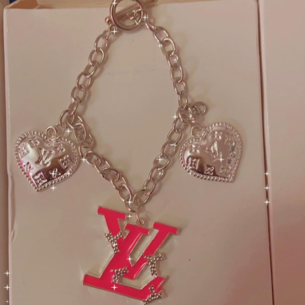 Image of Pink or blue designer Inspired louis vuitton charm bracelet 