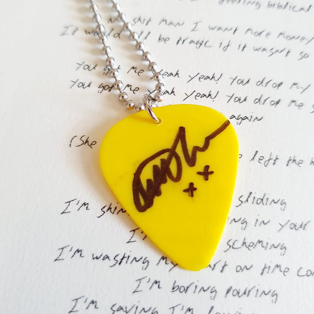 TRAMPOLENE signed used plectrum necklace