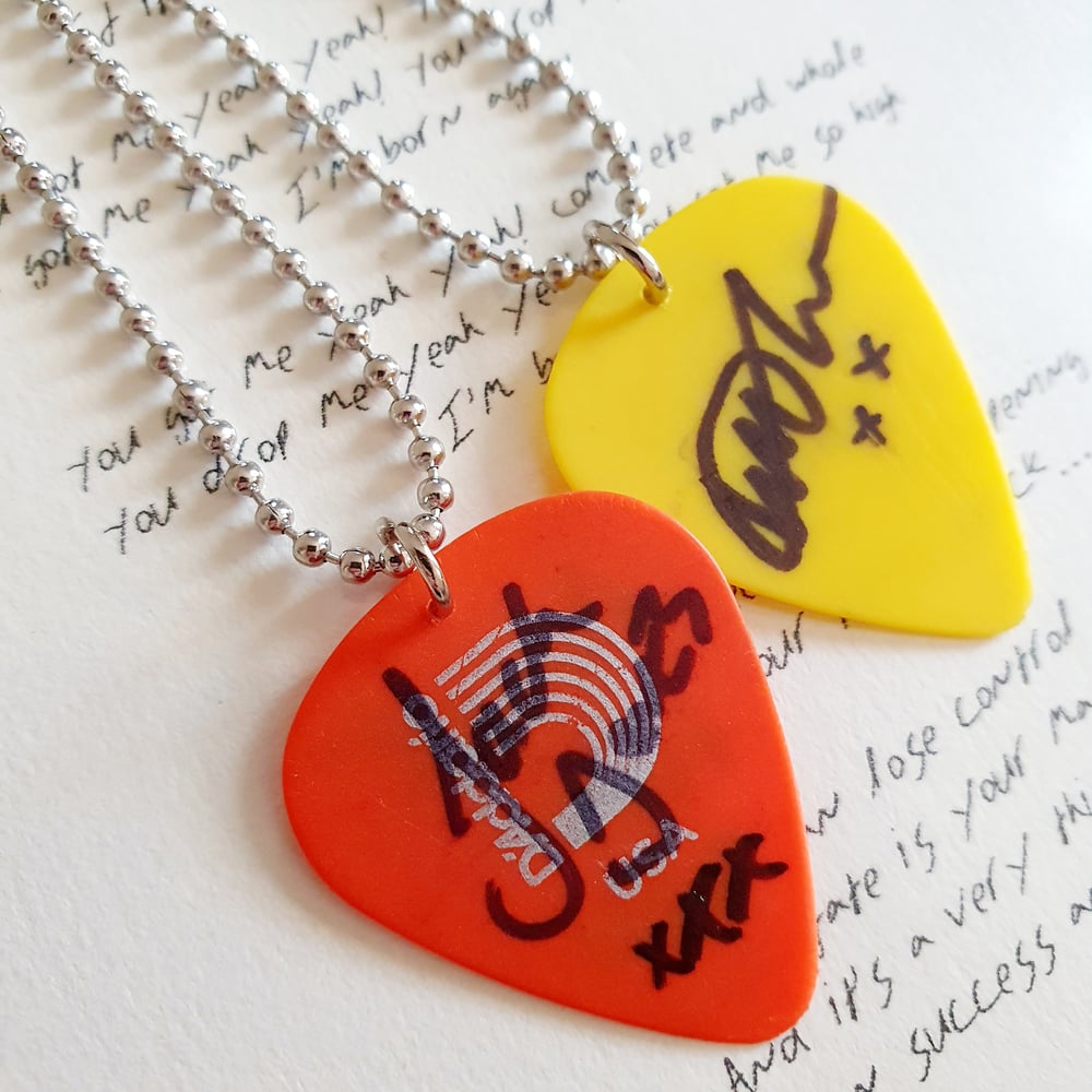 TRAMPOLENE signed used plectrum necklace