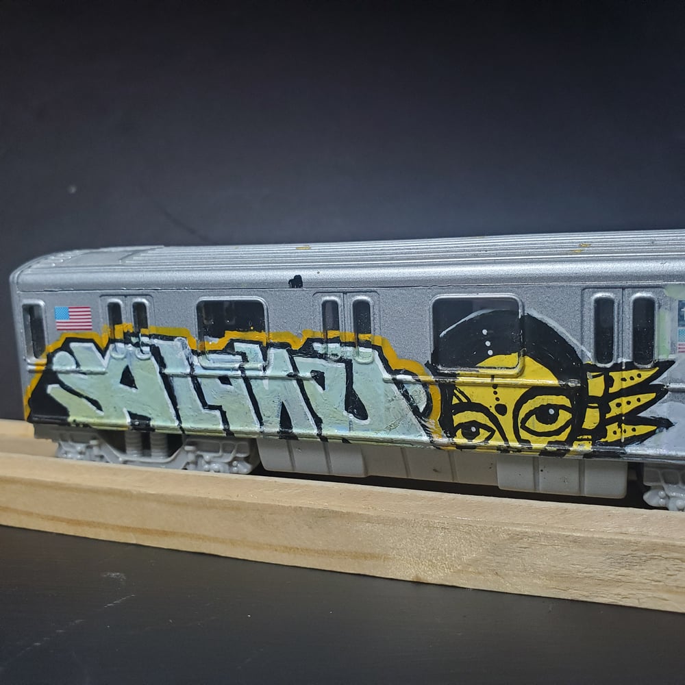 Image of ALONE x RASTERMS hand painted NYC subway train