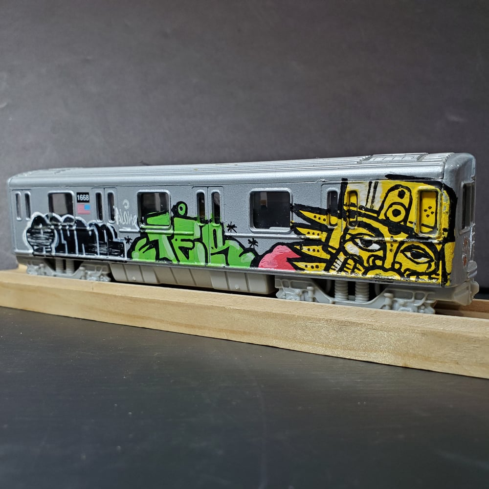 Image of ALONE x RASTERMS hand painted NYC subway train